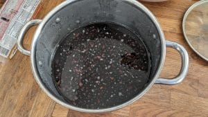 Soaking black beans in a pot